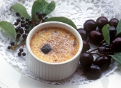 Pudding with elderberries and damsons, detail